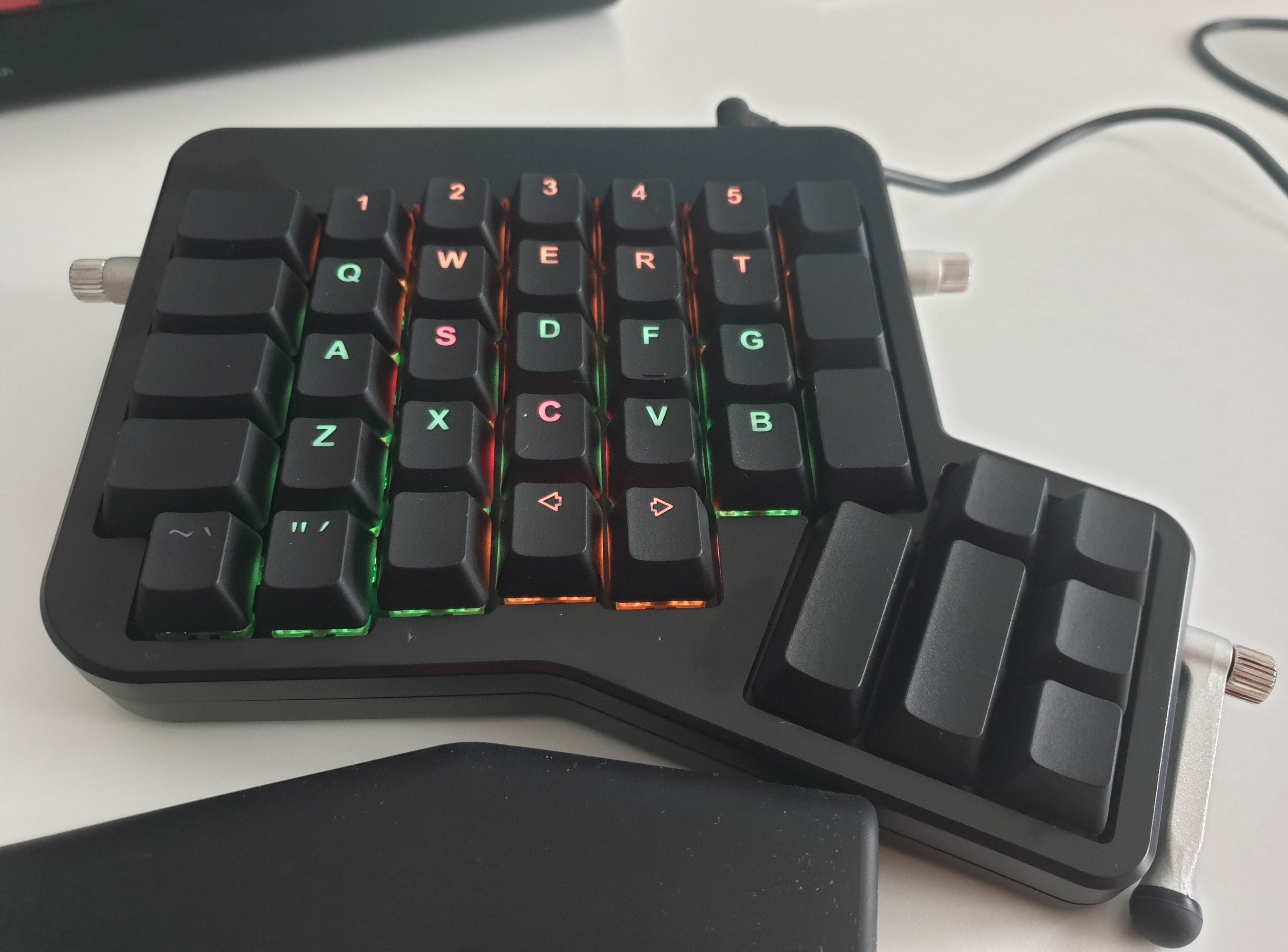 red and orange are special keys, also notice how so thumb keys are too far to use regularly